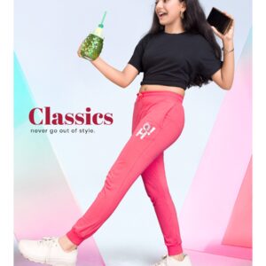 Pink solid regular-fit joggers,track pant has an elasticated waistband with printed, 2 pockets and cuffed hems